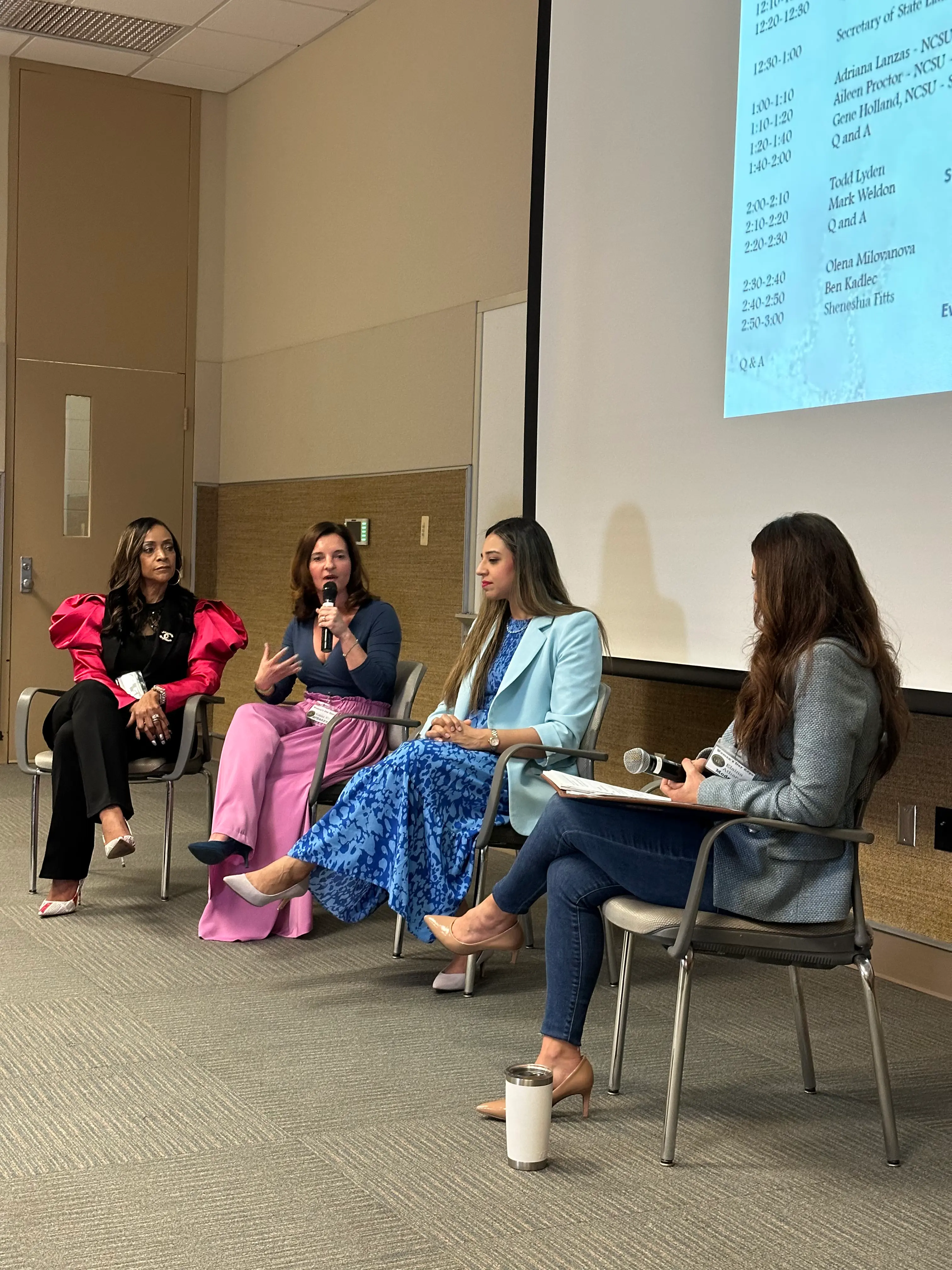 Yoana Nin speaking on stage at the Women's Day Expo